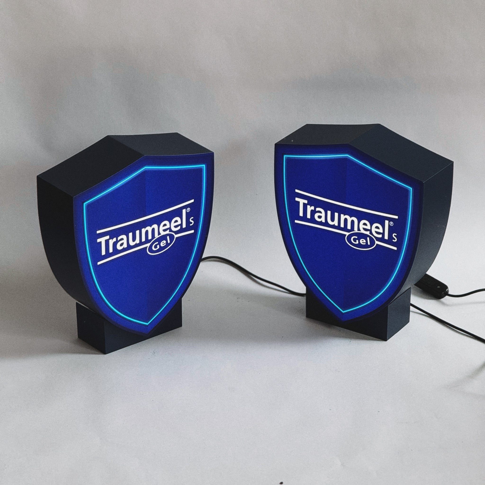 A lamp in the shape of a coat of arms with your image on a stand (height 25 cm)