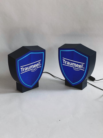 A lamp in the shape of a coat of arms with your image on a stand (height 25 cm)