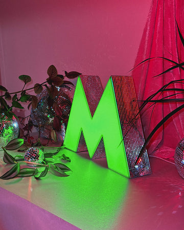 Volumetric letter-lamp "Metro" NeonCentre x De.Disco